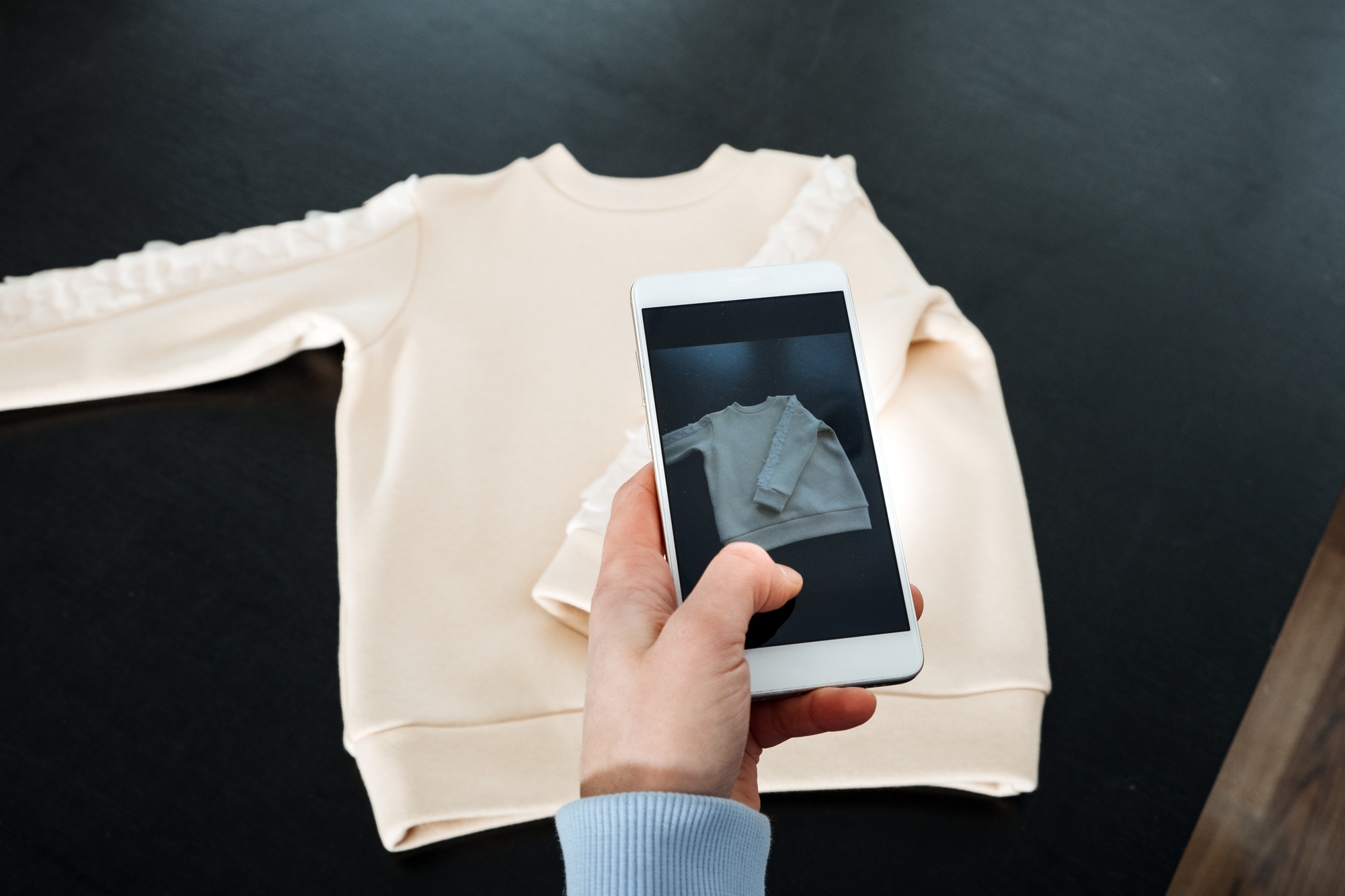 sell-online-on-the-internet-ecommerce-store-woman-taking-photo-of-clothes-on-smartphone-selling.jpg